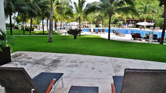 Deck pool view Villa-Magna ground floor condominium beach front Nuevo Vallarta